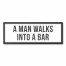 A Man Walks Into A Bar Typography 12x36 Black Framed Canvas